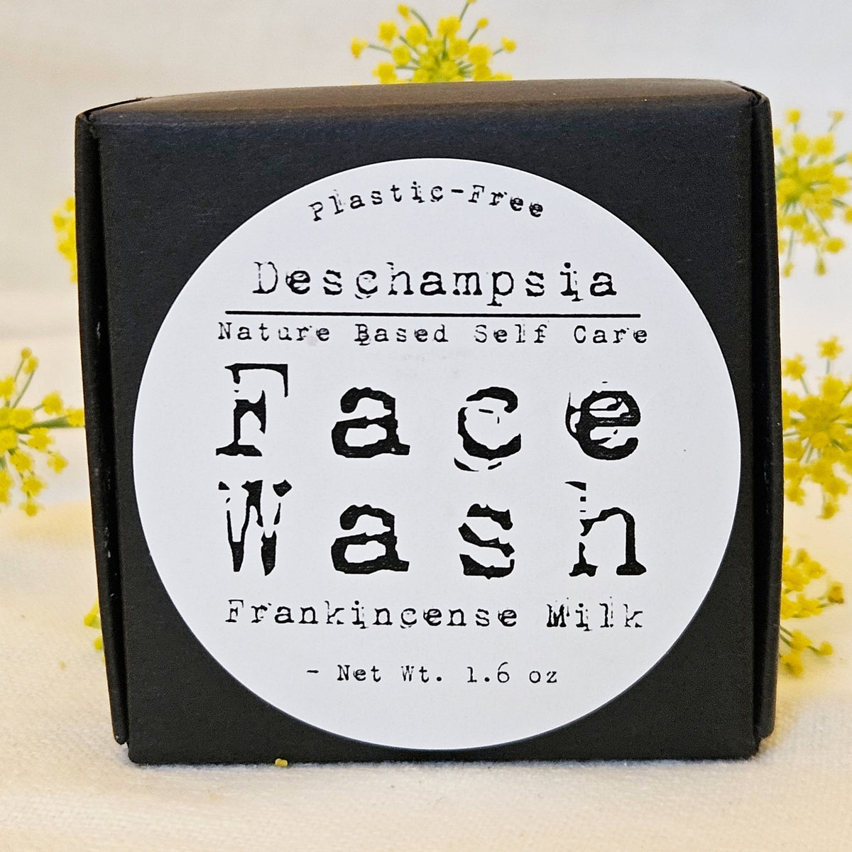 Frankincense Milk Face Wash box with yellow flowers