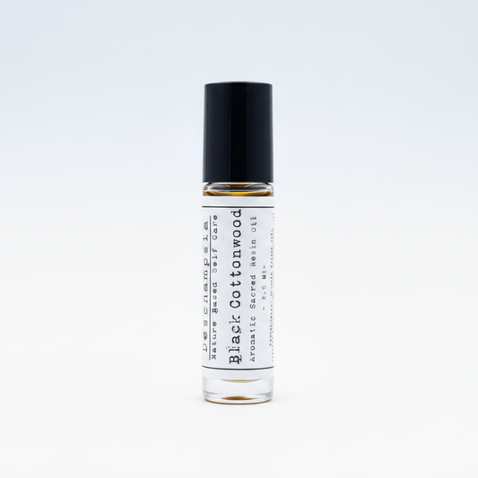 Roll-on bottle of 'Black Cottonwood' perfume oil on a white background