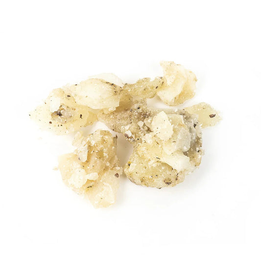 a close up piece of white copal resin